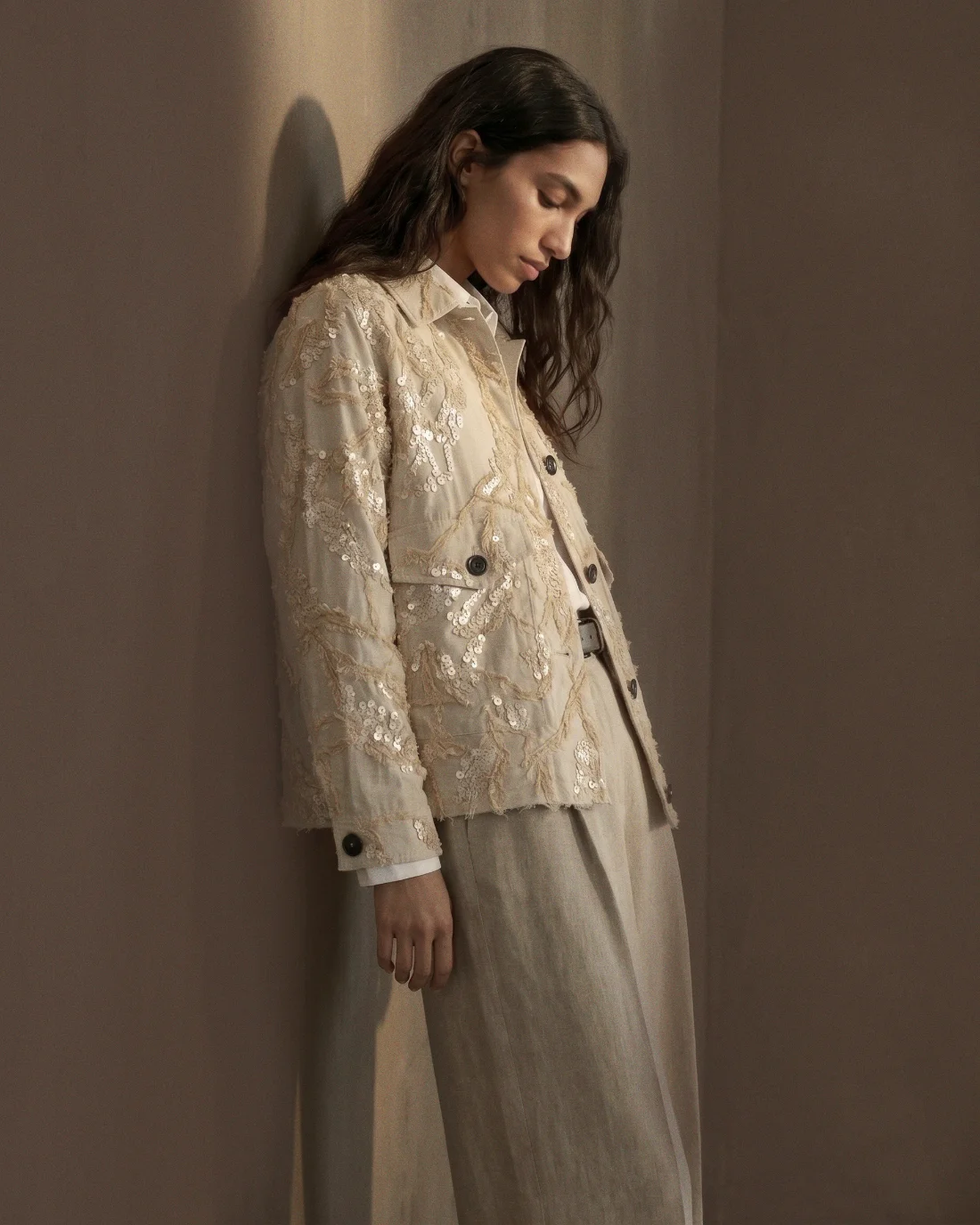 Recreated Brunello Cucinelli campaign image, warm wall environment.